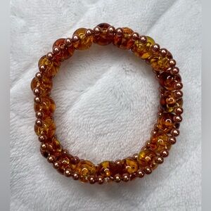 HAND STRUNG BROWN AND RUST BEADED BRACELET NWOT